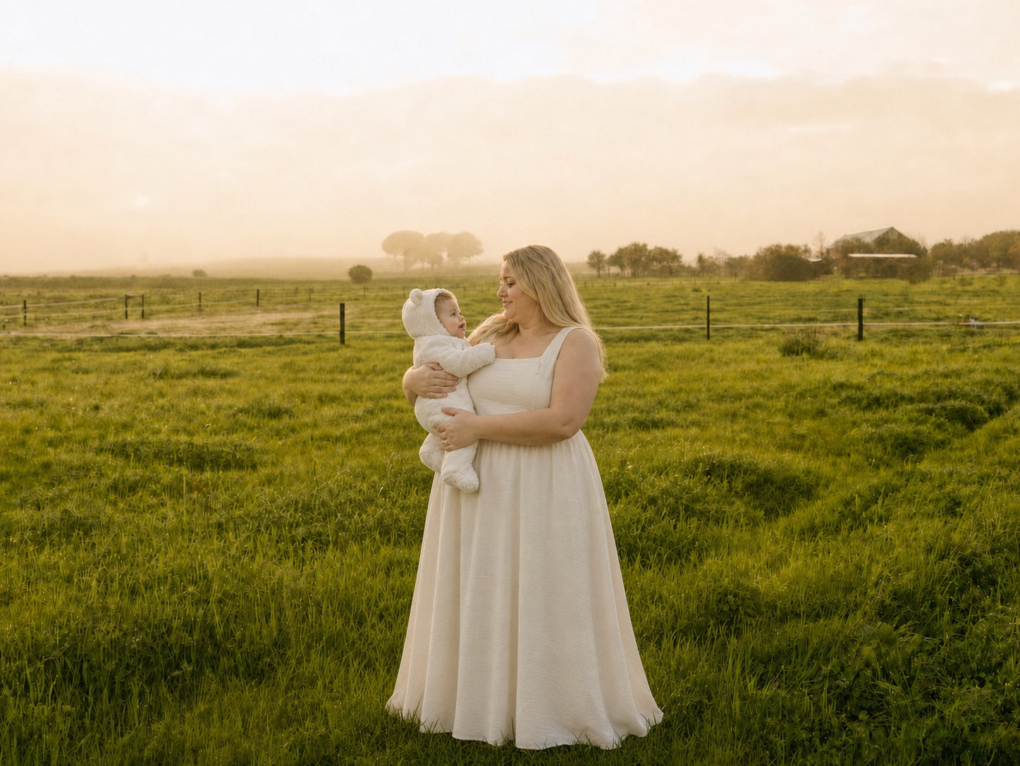 A mother wearing the LEMA Haven Dress in size XXL